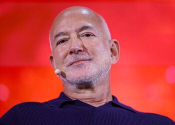 Soccer-Amazon founder Bezos nears deal to buy stake in Liverpool, reports say