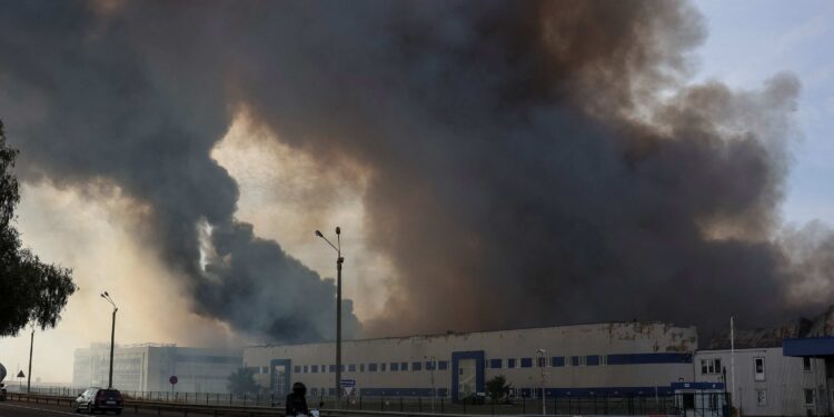 Russian attack on Kyiv injures 10, starts fire and damages high-rise building
