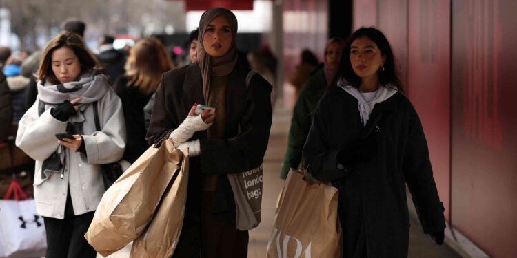 UK shoppers stay cautious as fuel costs bite, surveys show