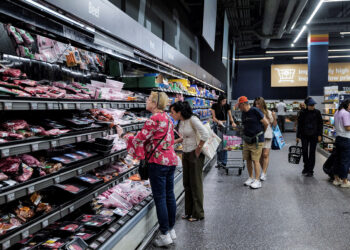 High inflation to persist globally into next year, Reuters poll shows