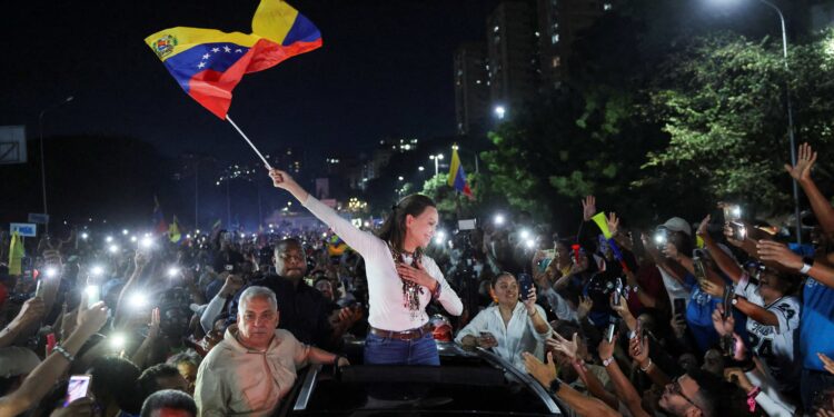 Now home, Venezuela opposition leader Machado walks tightrope with supporters, Trump